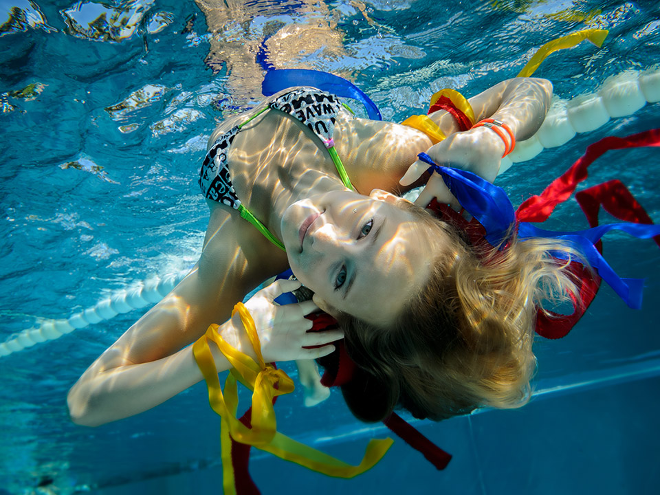 people swimming underwater