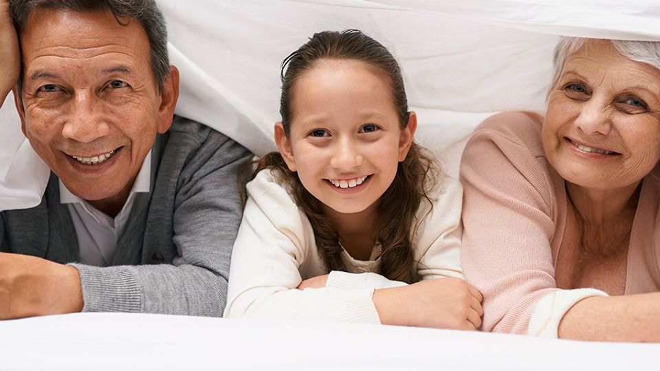 happy kid with grandparents