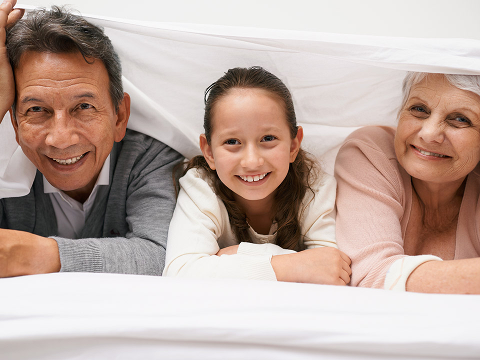 happy kid with grandparents