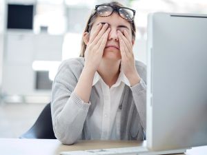 woman tired of looking at screen
