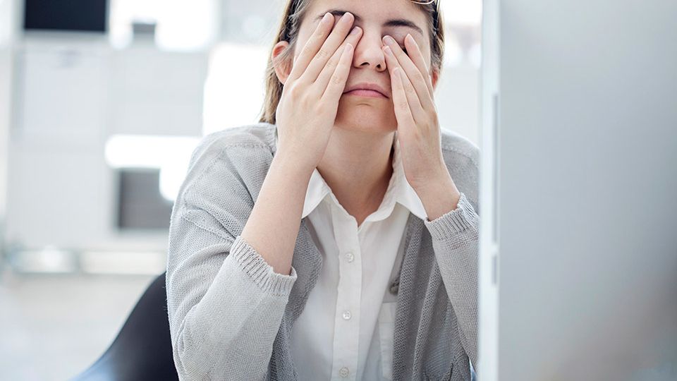 woman tired of looking at screen