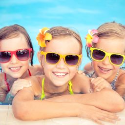 happy kids during summer at the pool