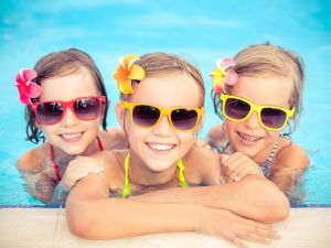 happy kids during summer at the pool