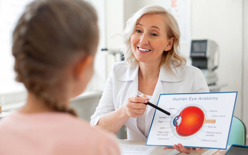 eye doctor talking to patient