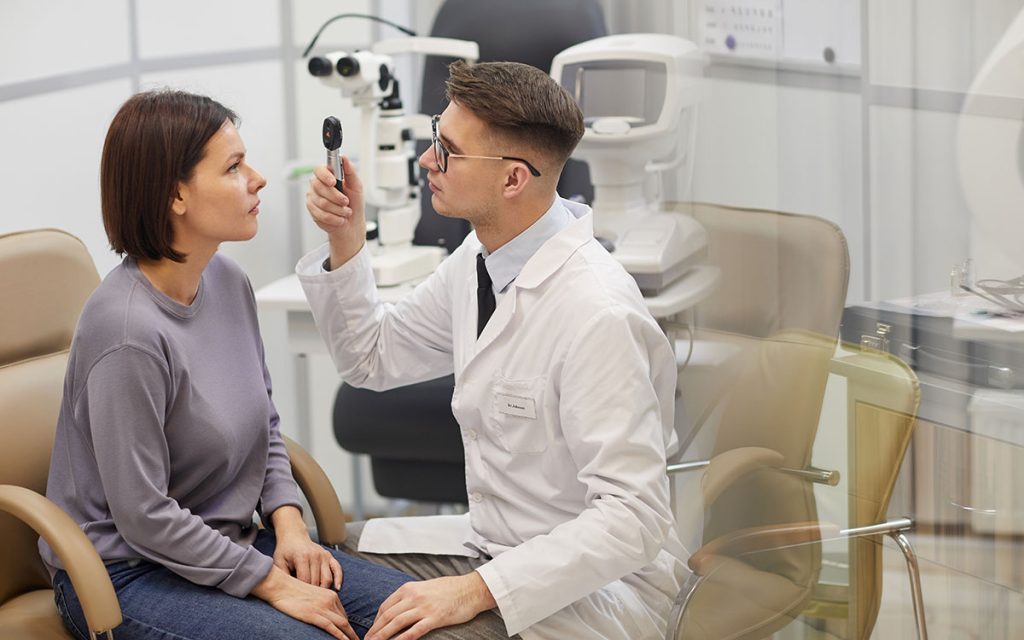 eye doctor with patient