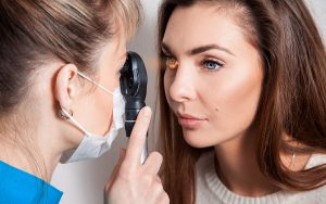 woman at the eye doctor checkup