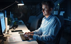 man working late at the office