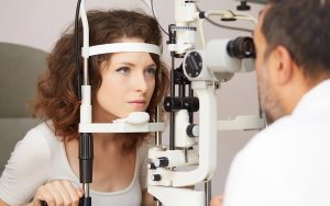 woman doing an eye exam