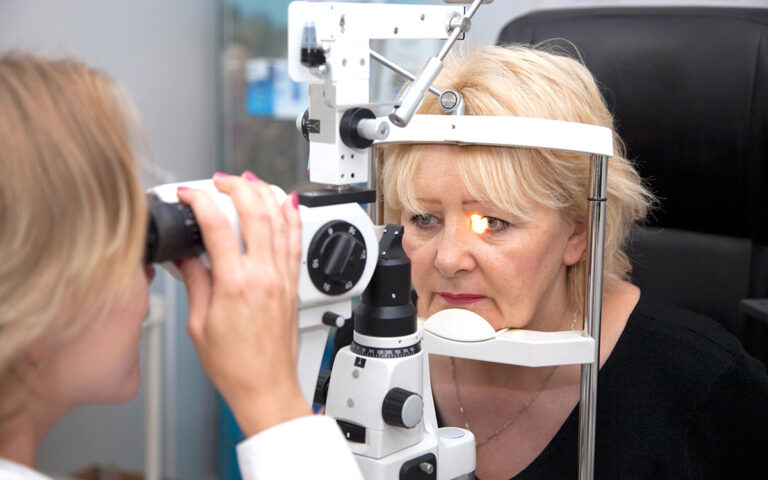 Doctor, and patient in ophthalmology clinic