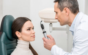 patient getting eye test by oculist in clinic