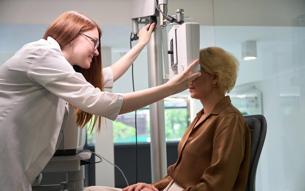 doctor checking her patient eyes