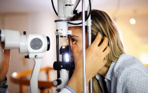 doctor examining patient's eye