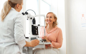 eye doctor talking to her patient about RLE