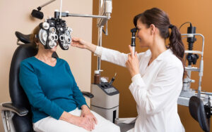 Optometrist Examining Senior Woman's Eyes